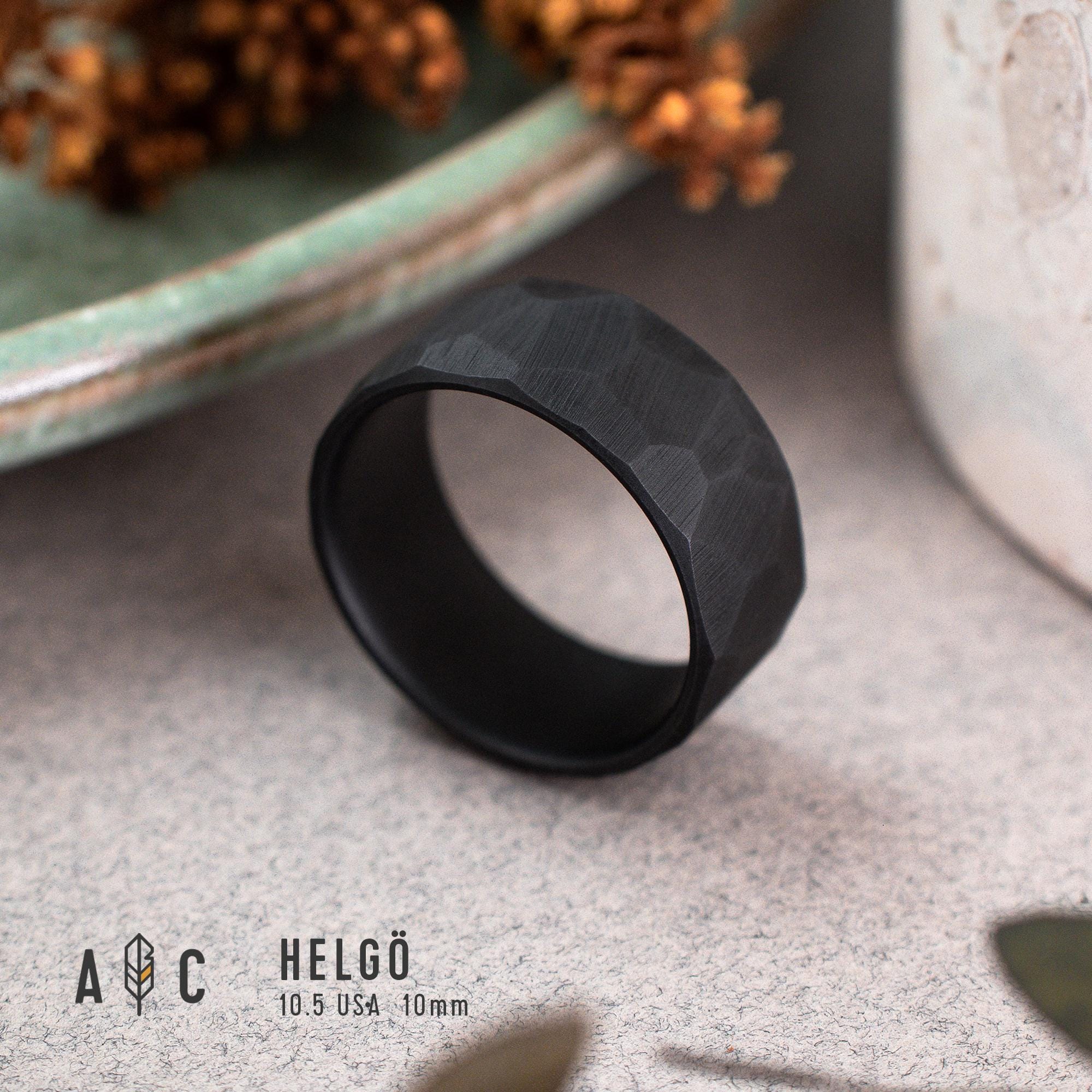 Pure fire-blackened titanium faceted ring. Engagement ring, wedding ring.