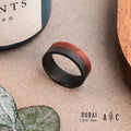 Fire-blackened titanium and Mopane wood ring. Engagement ring, wedding ring.