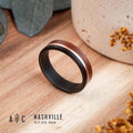 Fire-blackened titanium with copper liner and Rosewood and Ebony wood ring. Engagement ring, wedding ring.